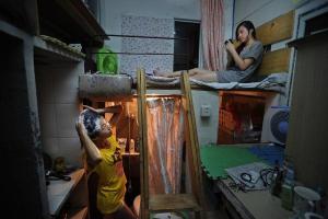 Apartamente capsulă în China, sau cum să supraviețuiască într-o cutie de sub frigider
